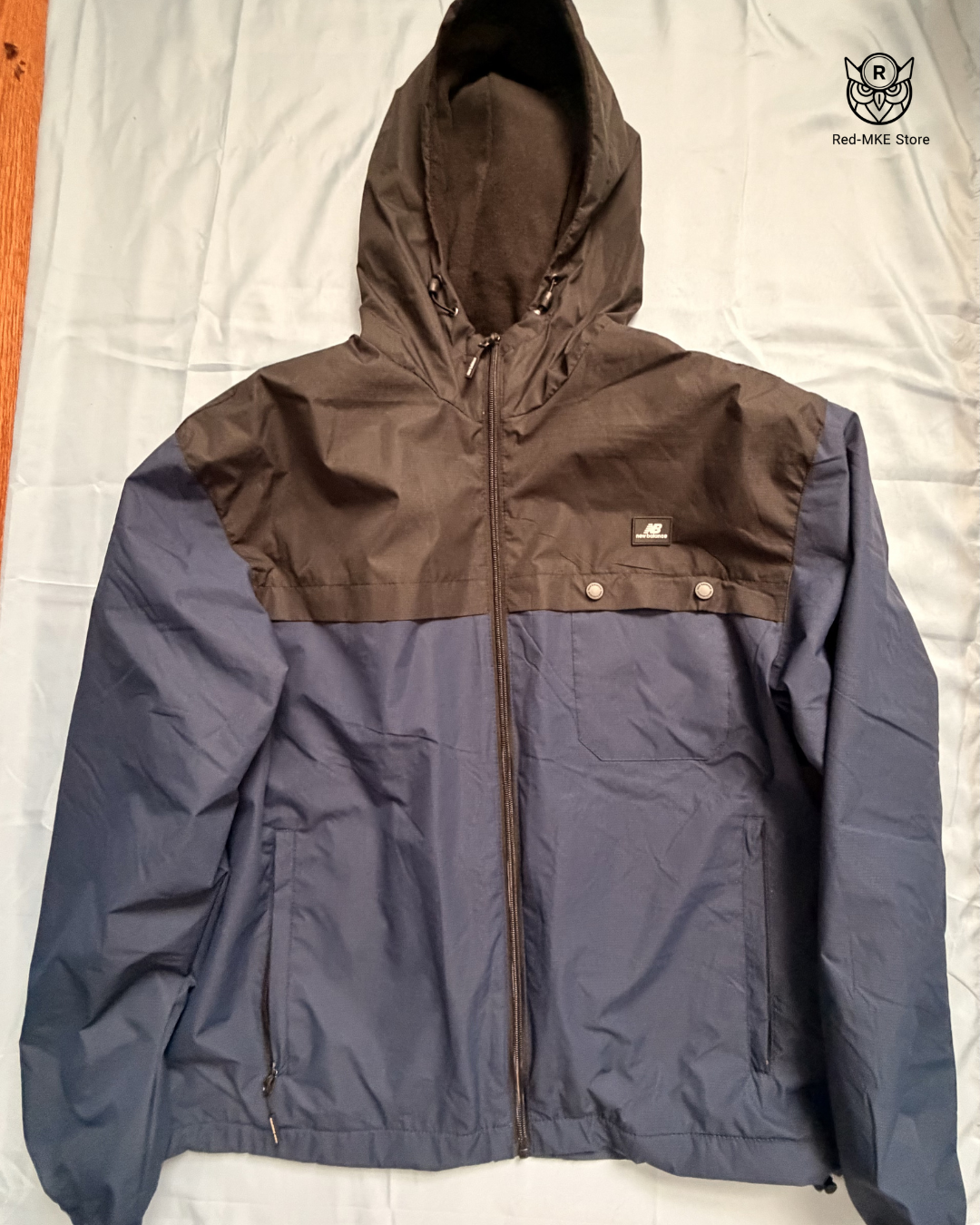 Chaqueta New Balance - Urban Block Windbreaker (Azul Marino/Negro)